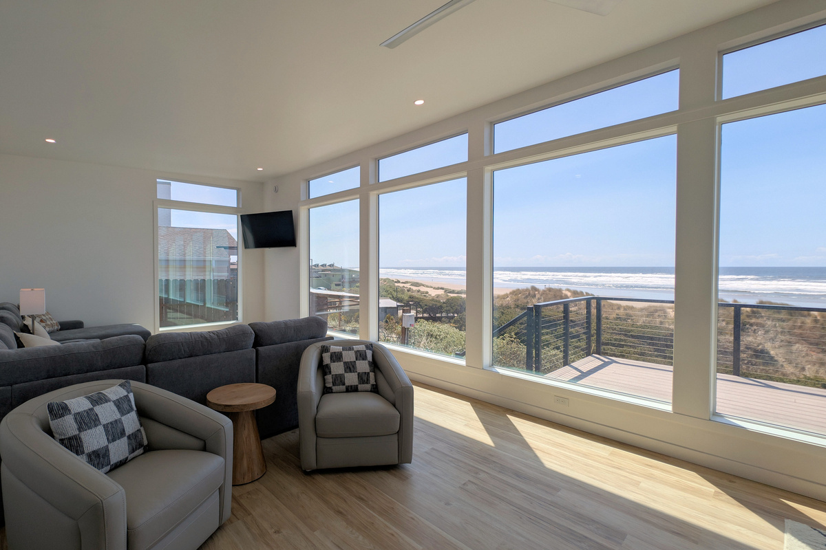 Living area with swivel club chairs and sectional sofa