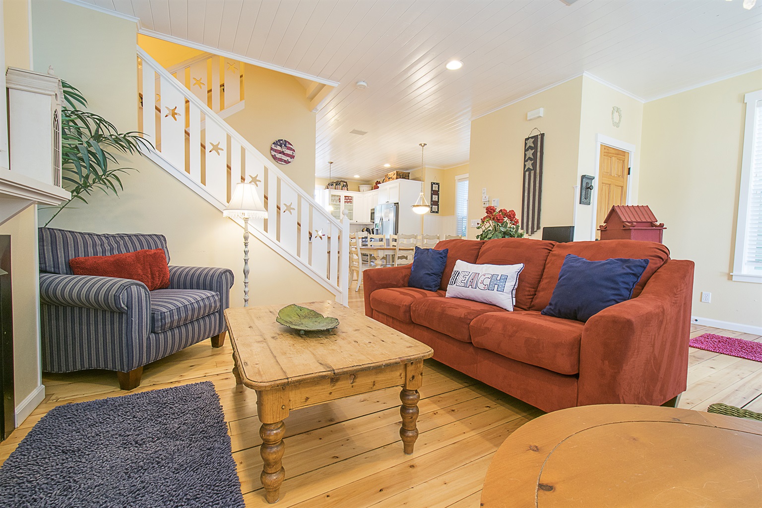 Experience classic beach cottage style — wood floors, white-painted wainscoting, and décor that complements the coastal vibe.