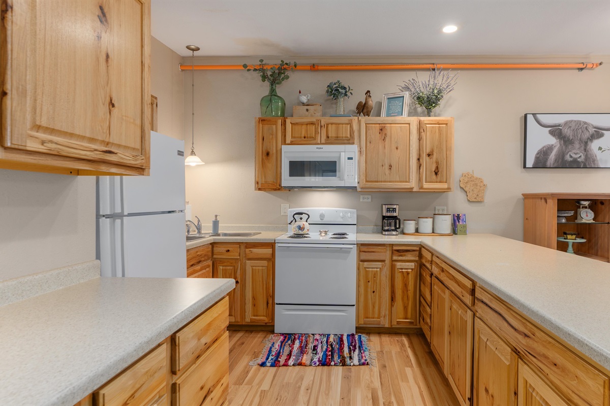 Raindrop has a fridge, stove and microwave for your use. 
