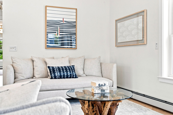 A cozy lounge space perfect for morning coffee, quiet reading, or relaxing after the beach.