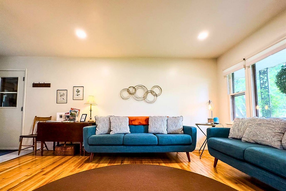 Blue and Inviting Sofa and Loveseat in the Main Level Living Room