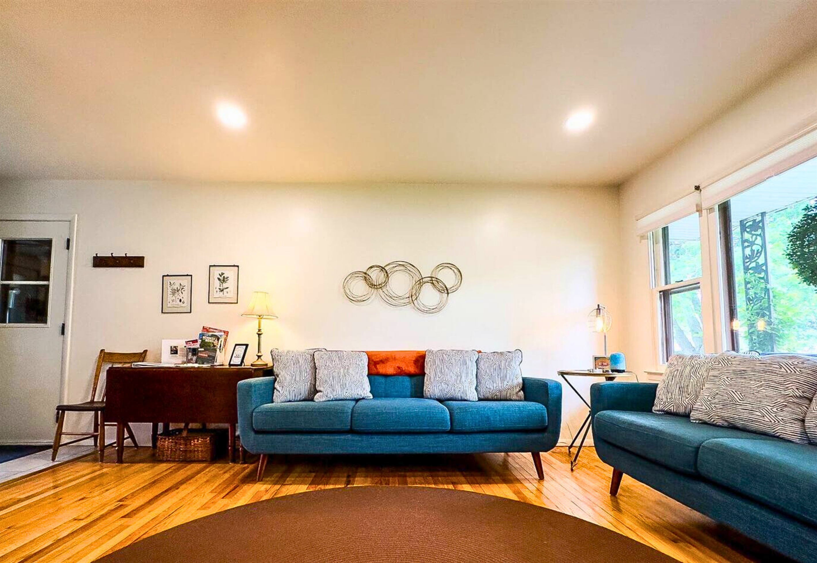 Blue and Inviting Sofa and Loveseat in the Main Level Living Room