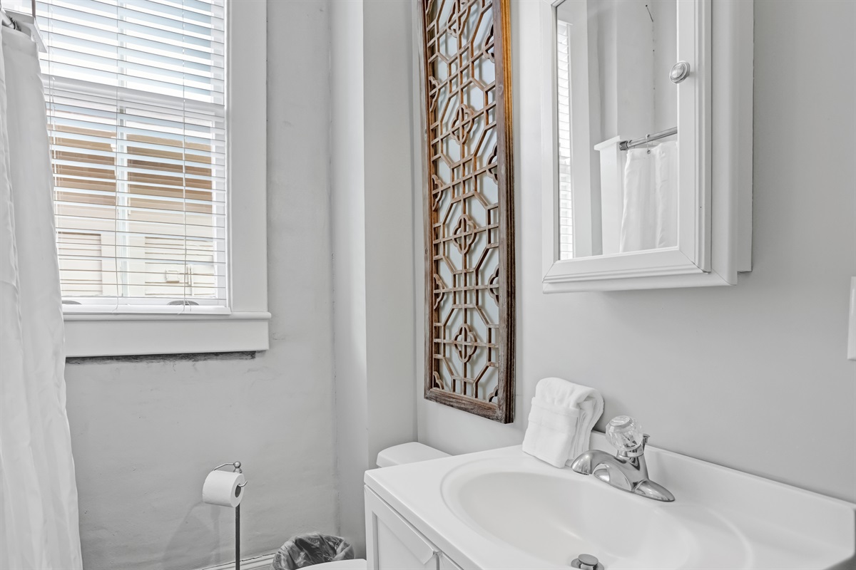 A clean, bright bathroom perfect for refreshing after a day out.