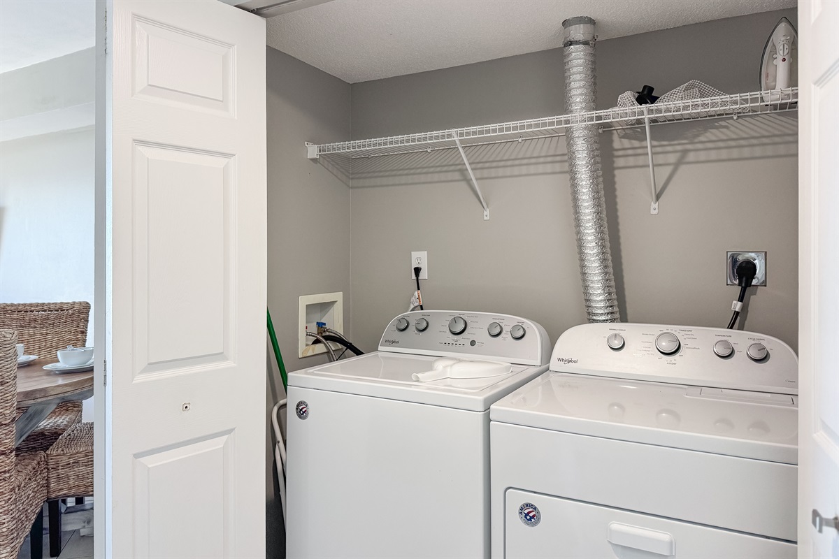 This well-equipped utility closet offers ample storage and a in-unit washer/dryer for your everyday needs.