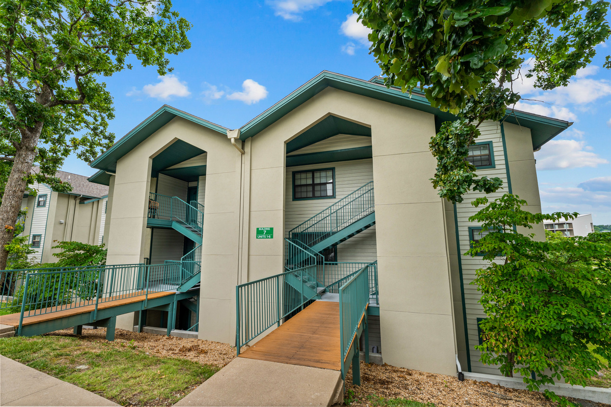 Important access note: the front door is reached by descending one exterior flight of stairs from parking. Once inside, the condo is entirely on one level.