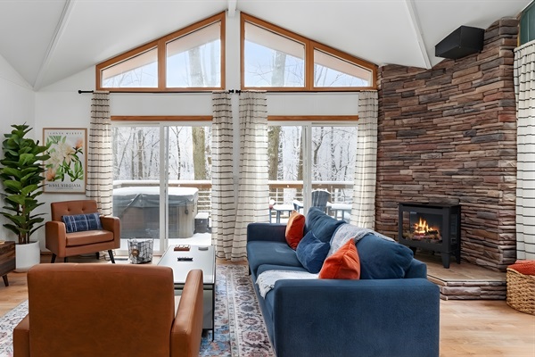 Enjoy the warm fire in the living room, overlooking the woods!