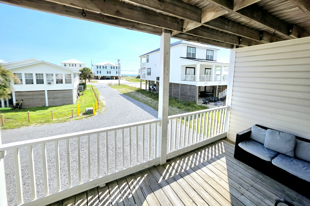 Covered balcony overlooking the street