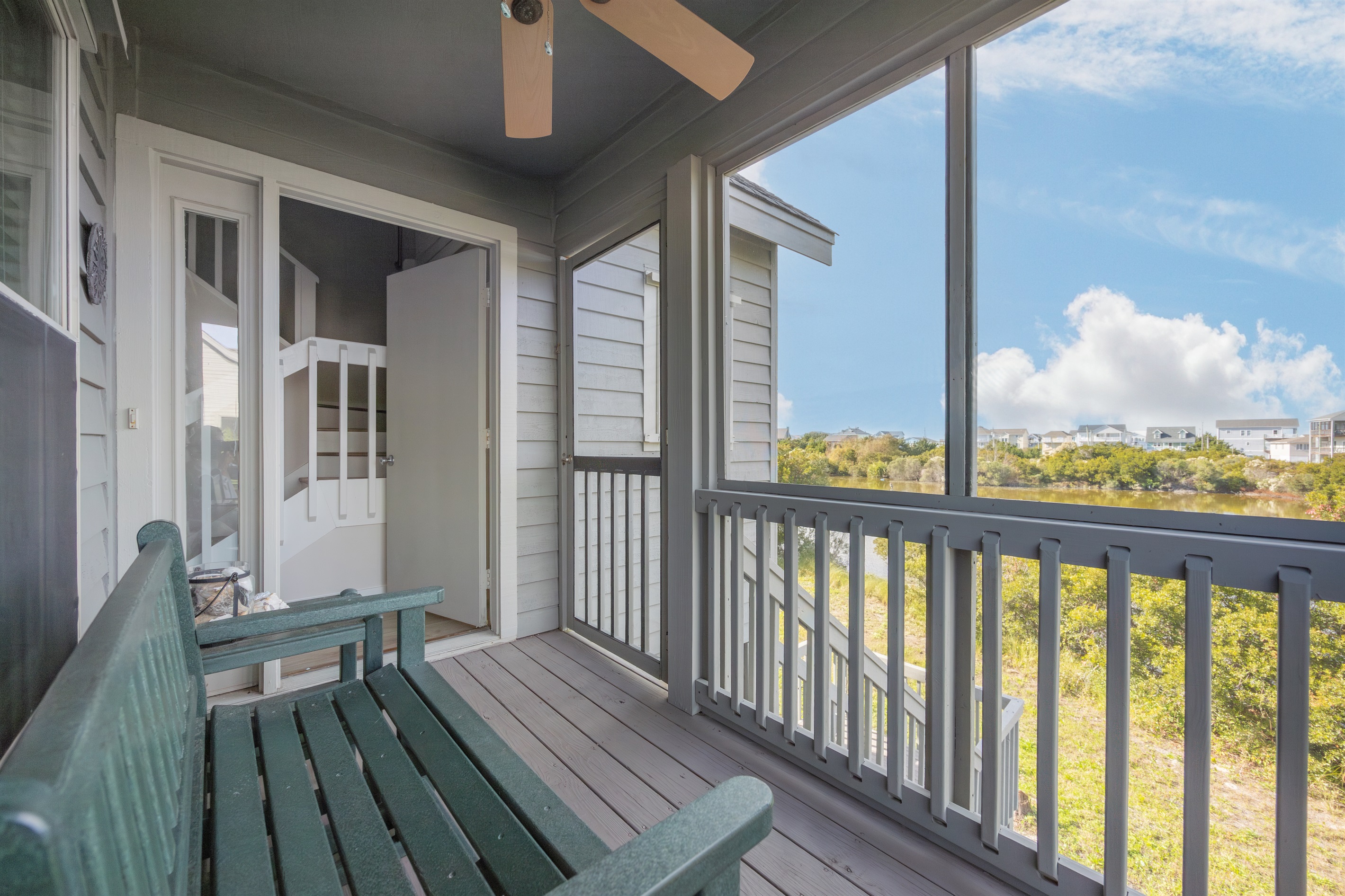 Breezy screened porch—perfect for morning coffee and sunset unwinding.