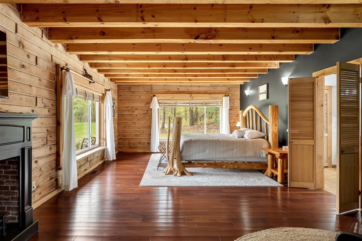 Master bedroom to the right of the kitchen with electric fire place and full bathroom.