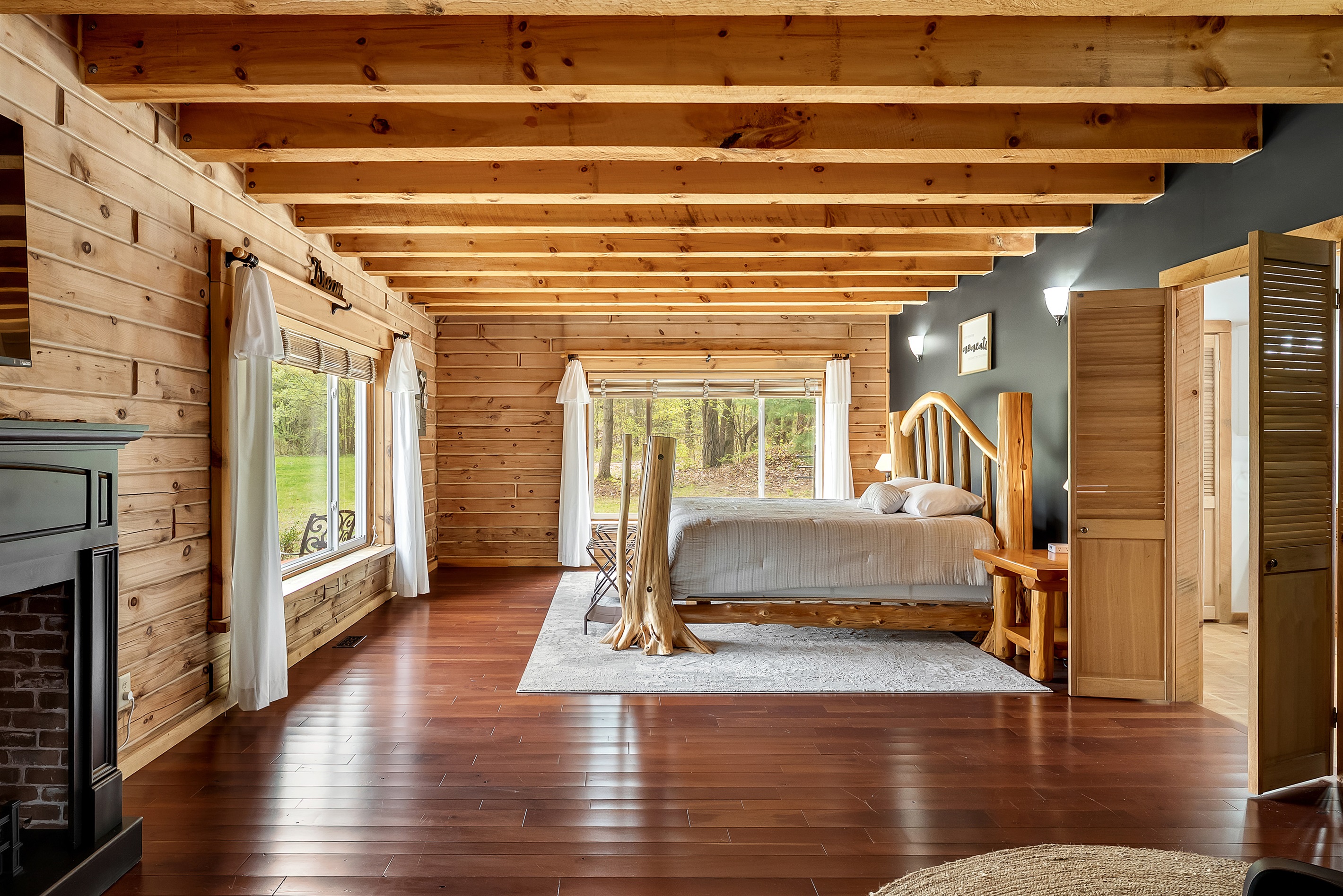 Master bedroom to the right of the kitchen with electric fire place and full bathroom.