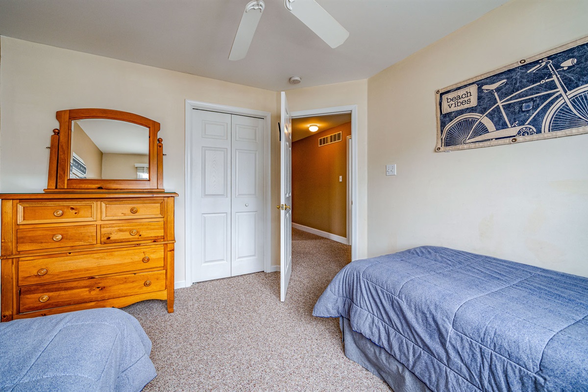 Two twin beds and a dresser