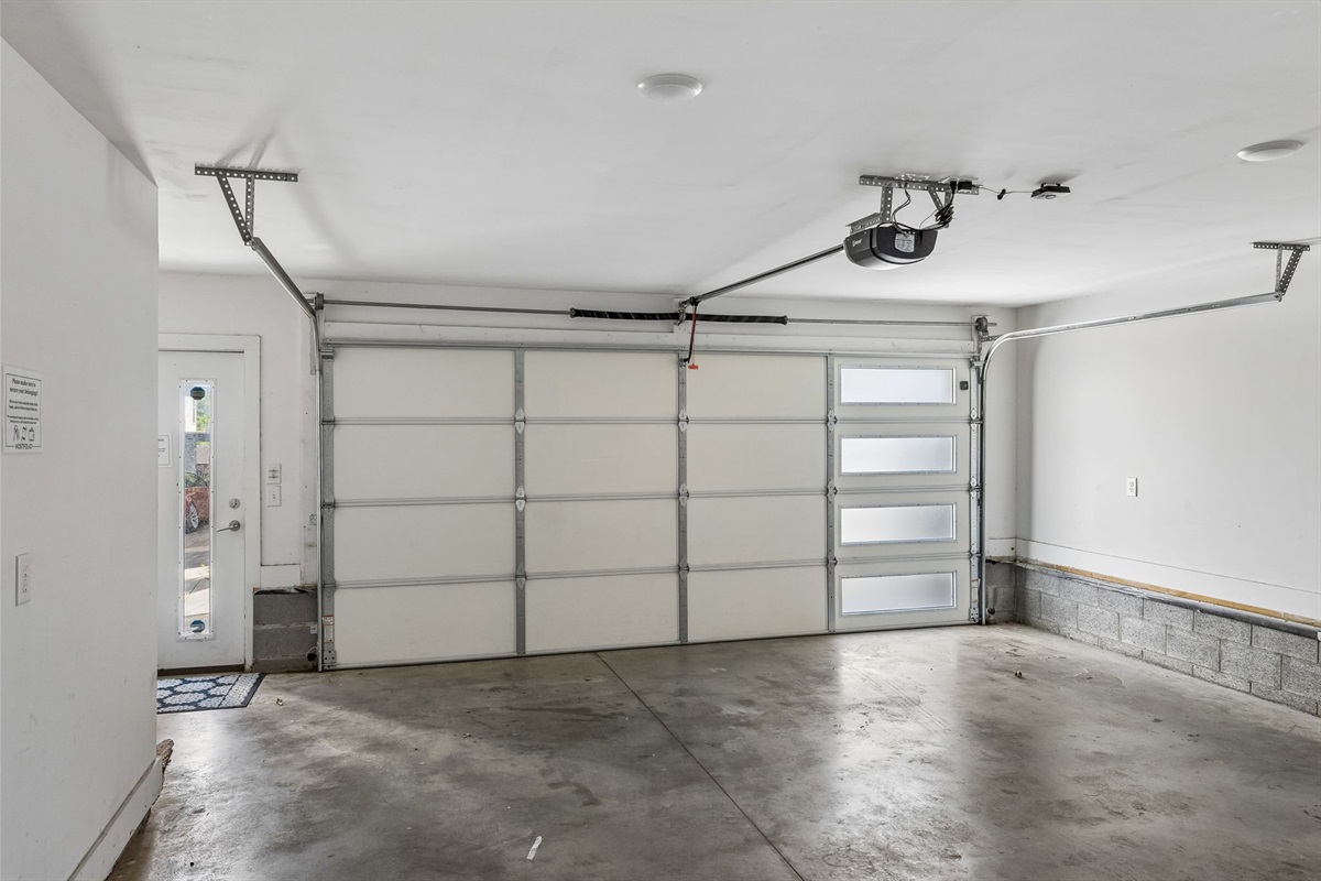 Safely park two full-size vehicles inside the garage to keep your belongings secure.
