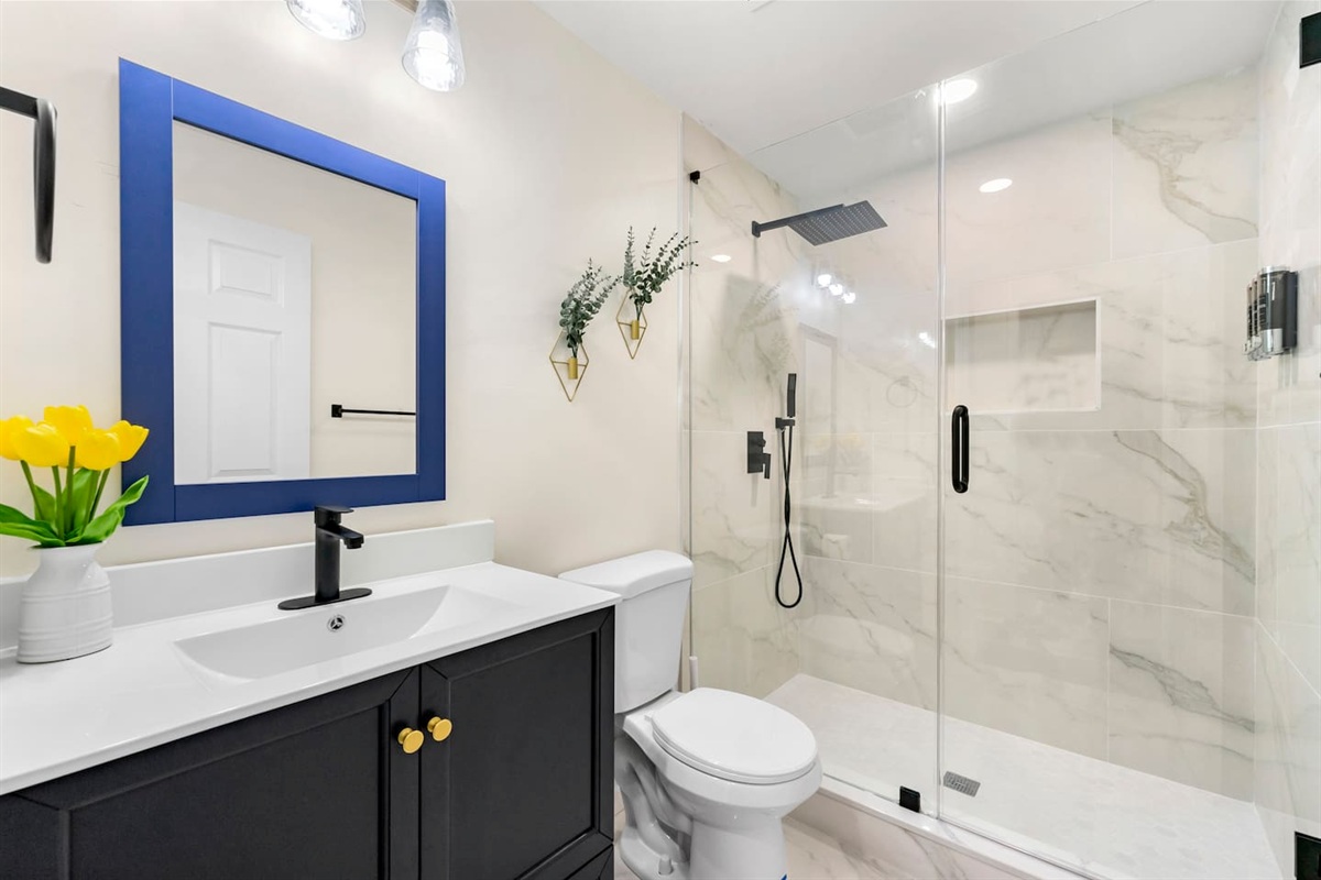 Basement level full bathroom.