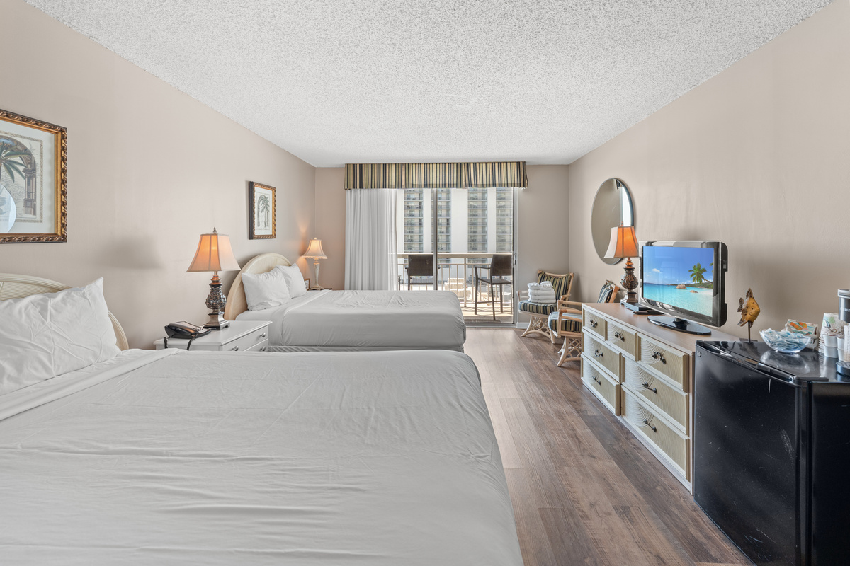 3rd Bedroom (studio) with 2 queen beds, kitchenette and private balcony access
