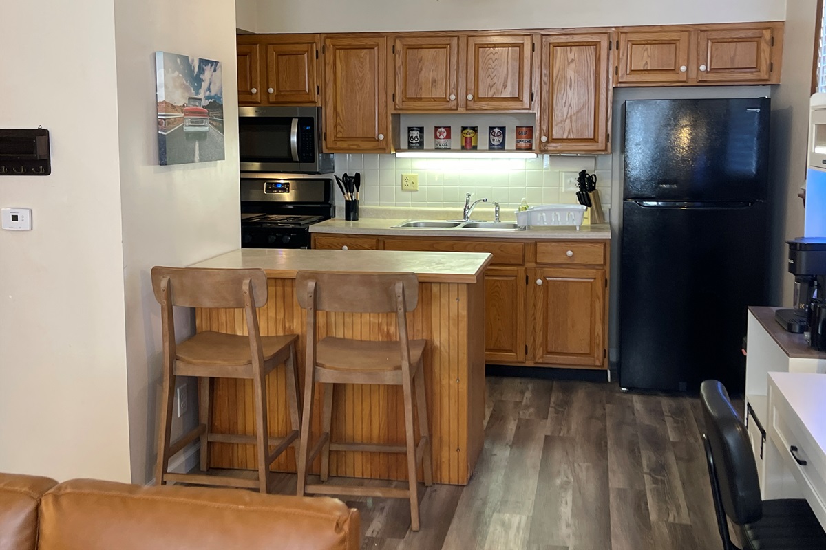 Fully Stocked kitchen with full size stove