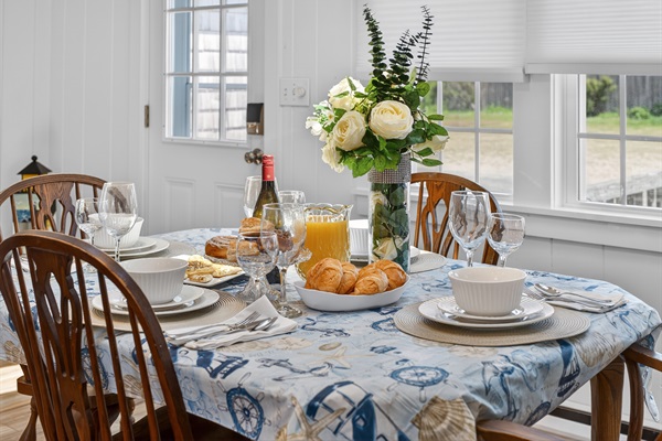 Intimate dining space for four, perfect for special occasions and shared moments.