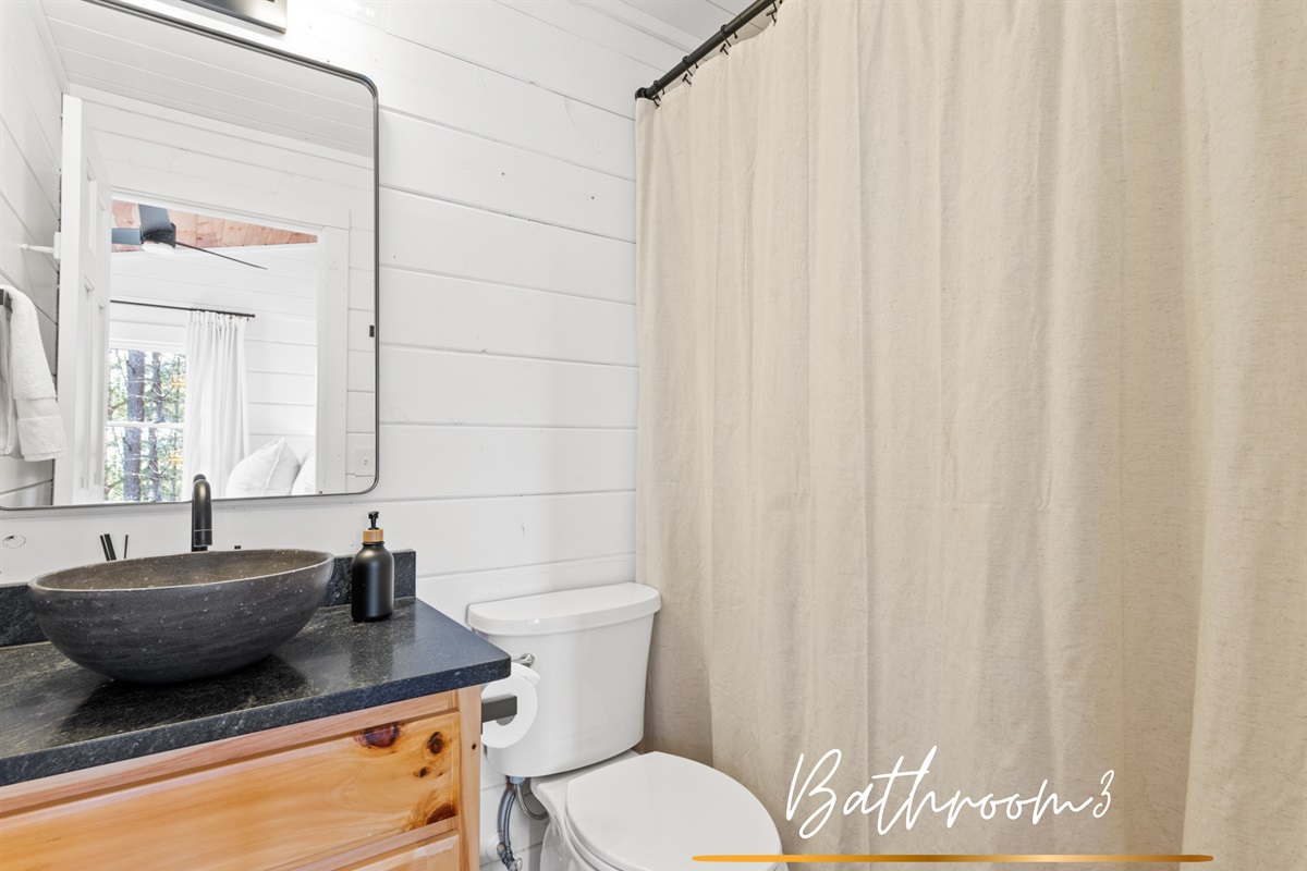This clean and inviting bathroom is perfect for a refreshing start or end to your day.