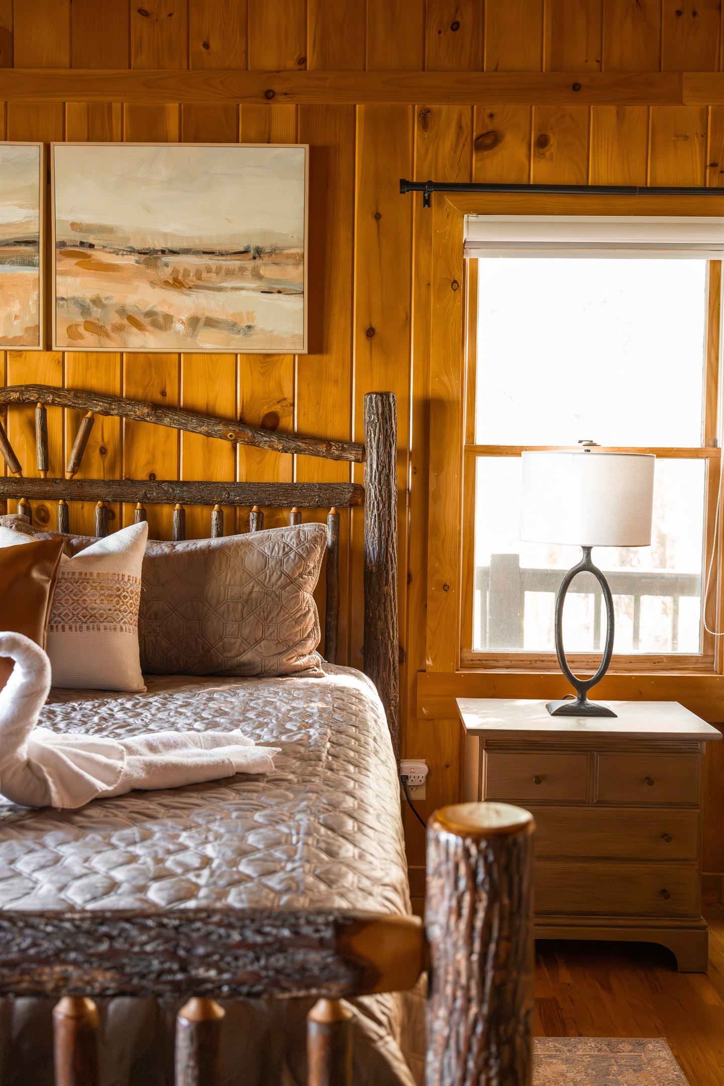 Thoughtful touches throughout the master bedroom from soft textures to warm wood accents, a plush king bed, and a sound machine designed for restful mountain nights.