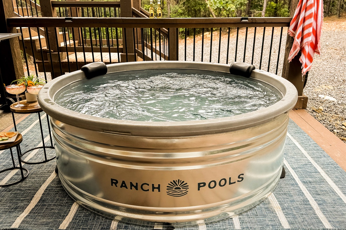 Romantic, secluded cocktail pool in total privacy designed for couples to relax, reconnect, and enjoy a resort-style dip while enjoying the mountain views together.