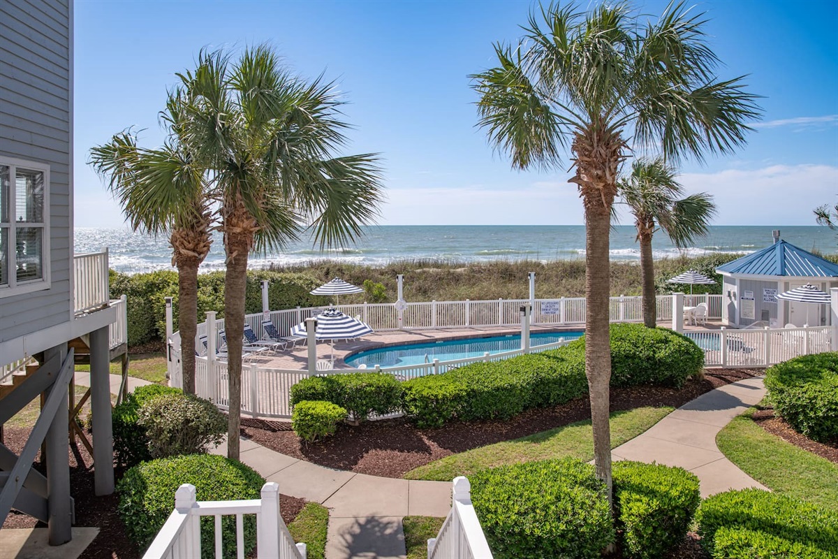 Pool view from first floor porch.  So close to the pool and the beach!