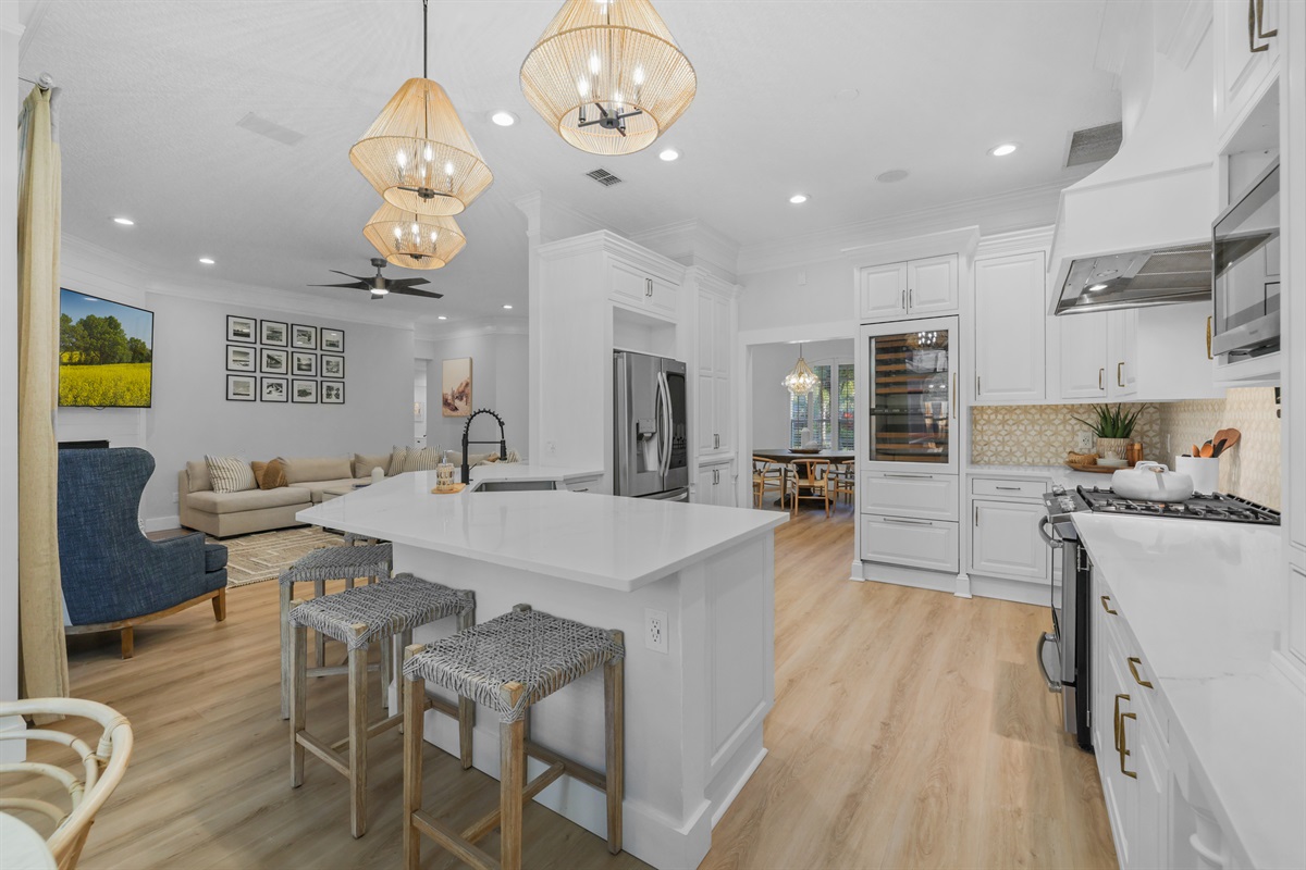 Gather around the oversized island &mdash; perfect for cooking, coffee, and conversation