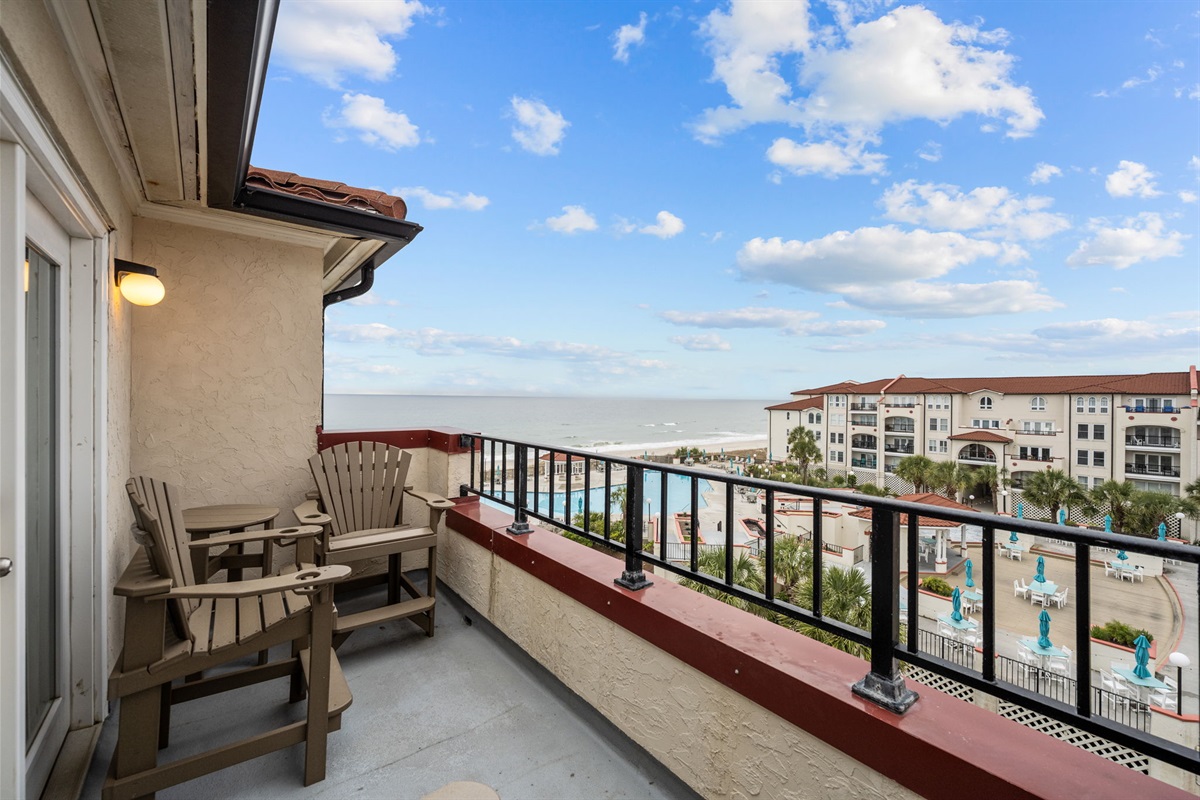 Comfortable oceanfront balcony with ocean sunrise, sunset and resort views