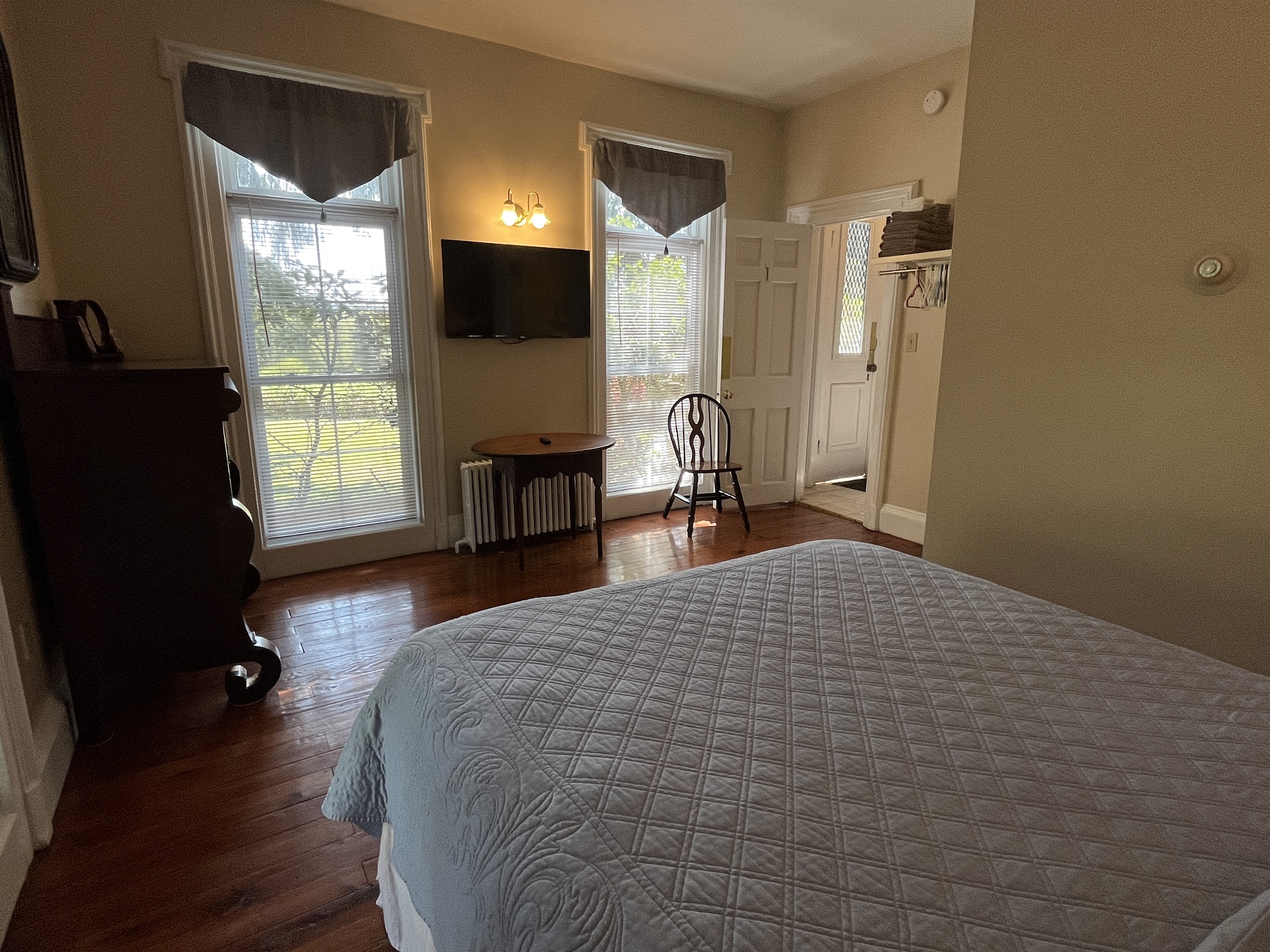 1860 Spencer House  - 1st floor bedroom #1 w/ Queen view into the main hall.