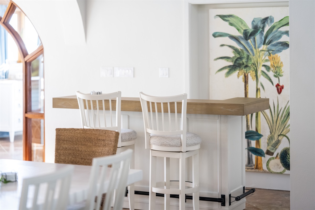 Casual bar seating area, perfect for cocktails and quick bites.