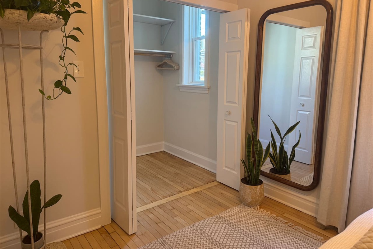 Bedroom detail showing closet and decor