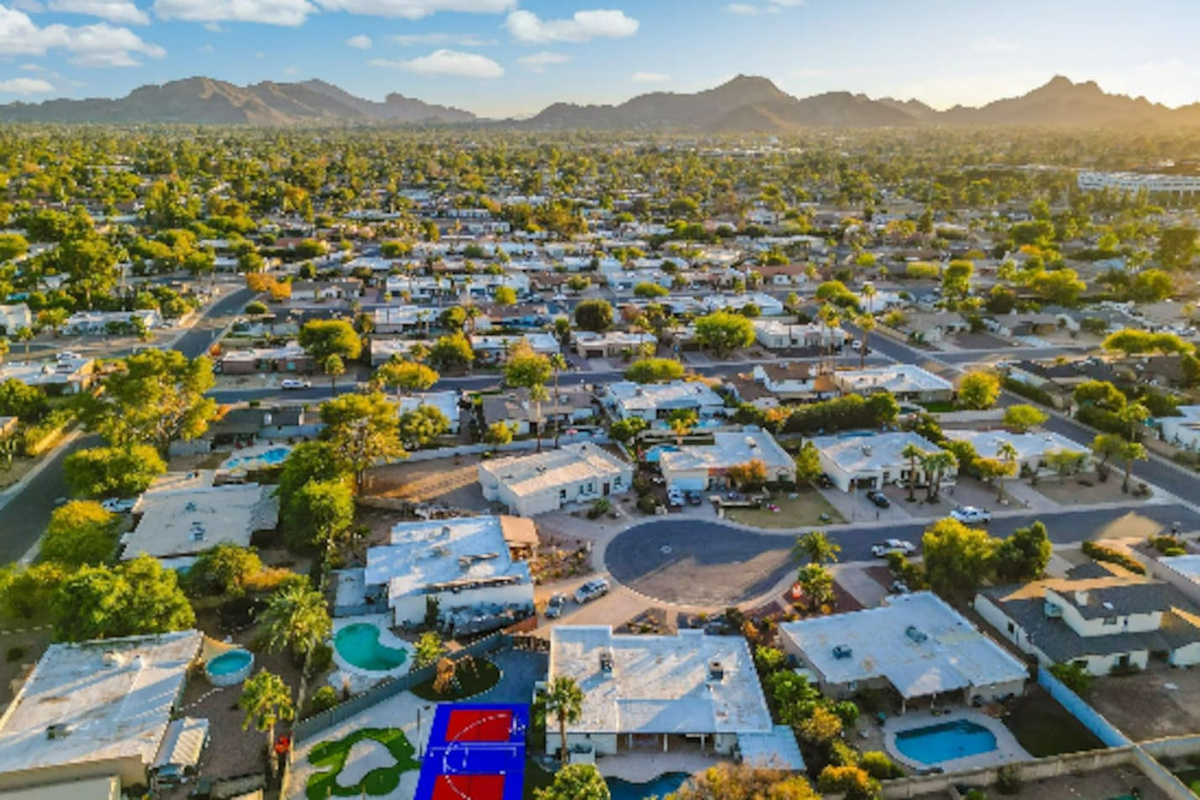 Mountains in the distance, palm-lined streets below — this is the kind of setting that makes the whole trip feel like a getaway.