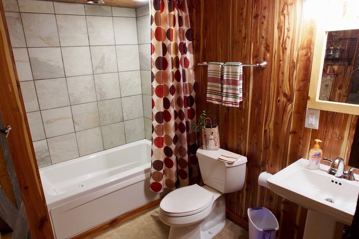 Well Appointed Bathroom with Jetted Tub and Rainforest Shower