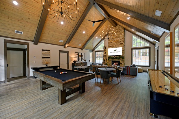 Where cabin style meets friendly competition — enjoy pool, shuffleboard, and cozy fireside hangs in the stunning Three Creeks clubhouse