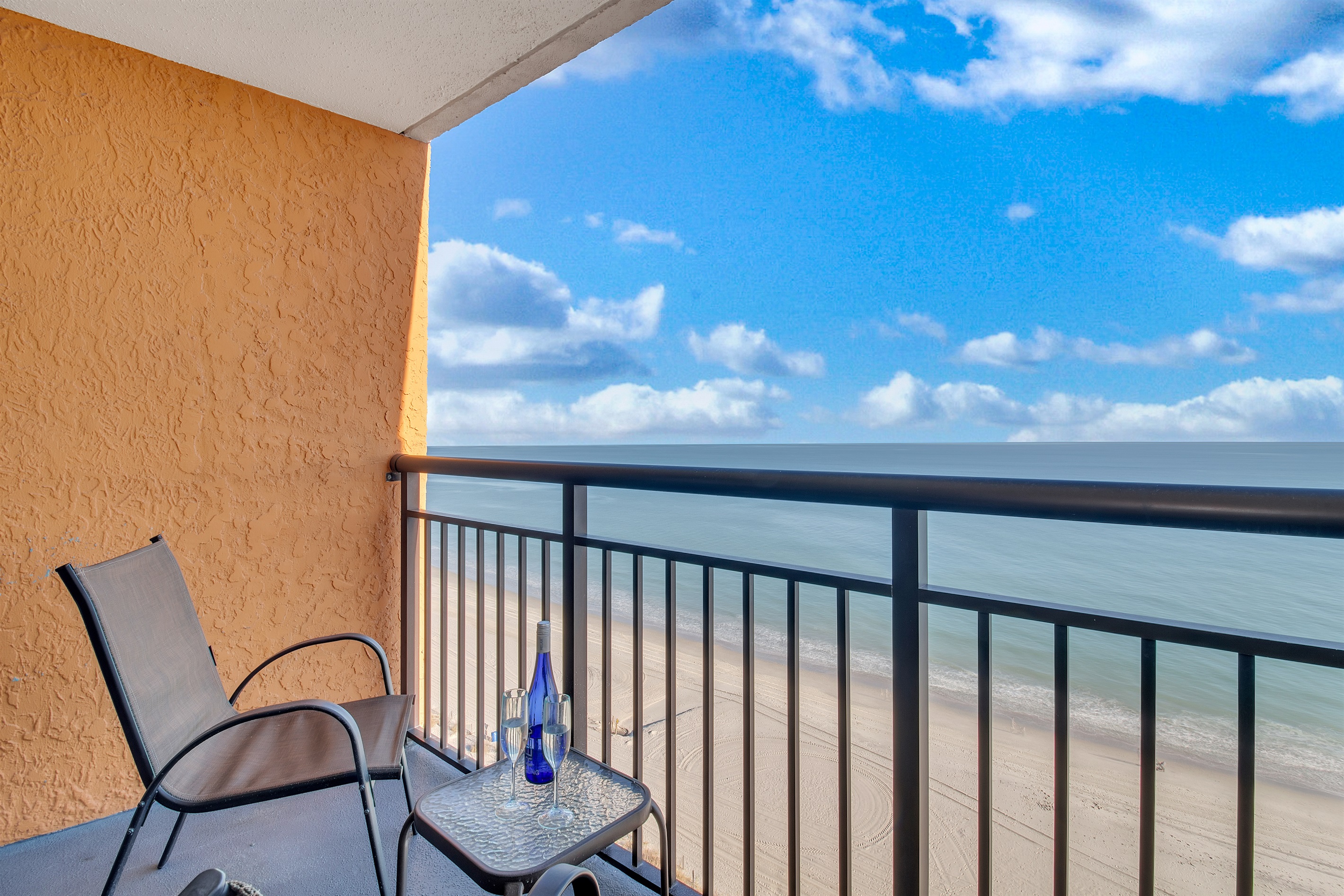 Sit back, relax and sip a cup of coffee while enjoying the front row seat view of the skyblue sea.