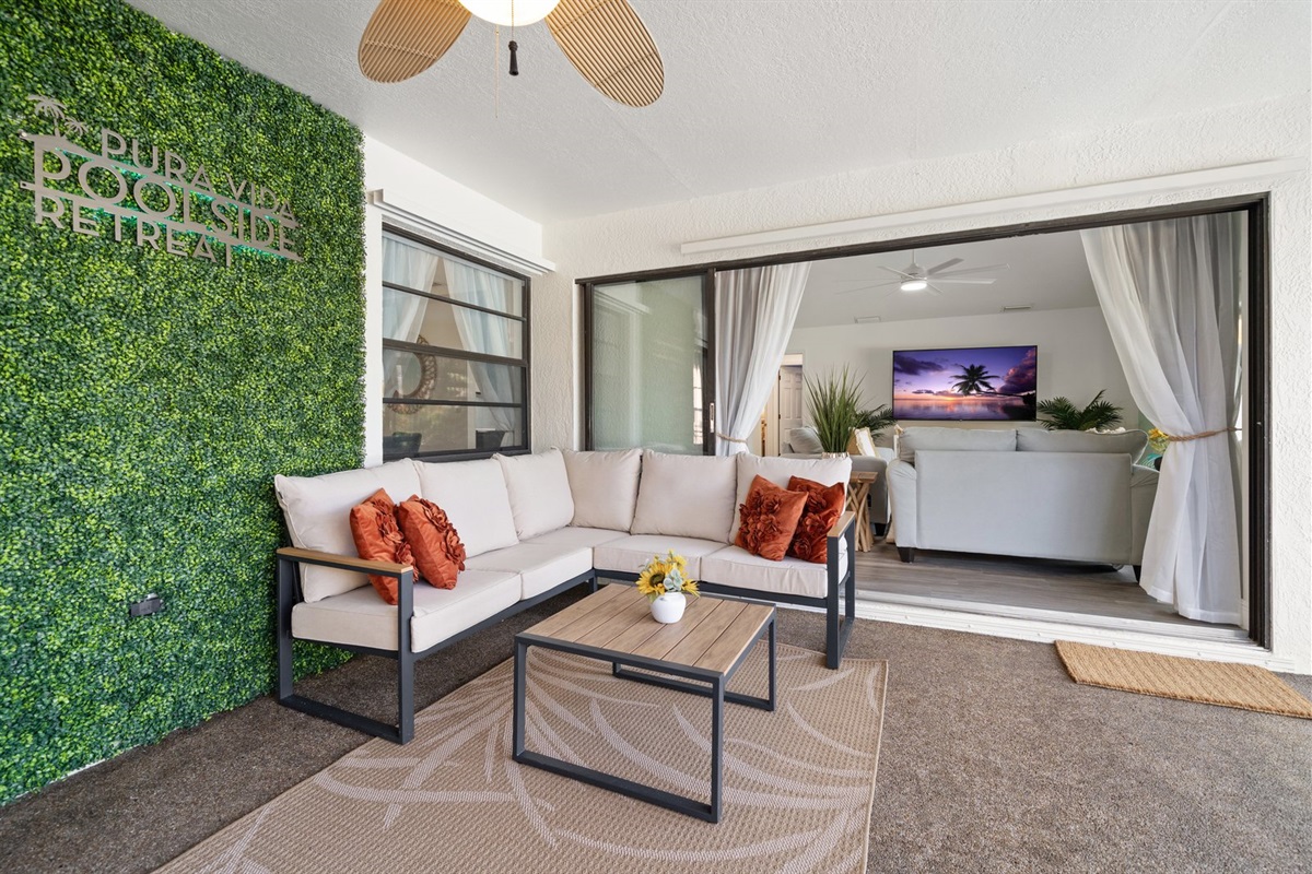 Screened Covered Lanai with Sliding Pocket Doors looking into the family room