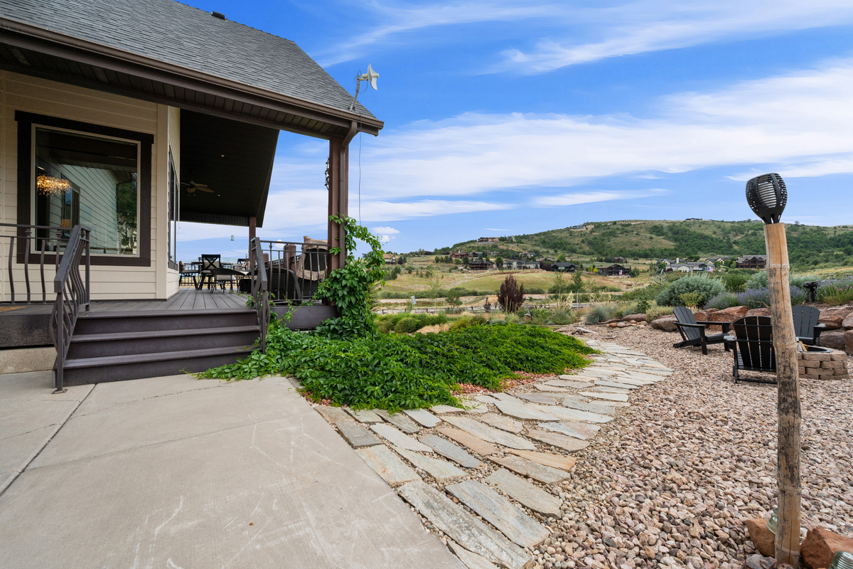 Enjoy peaceful mornings and breathtaking views from the covered outdoor living spaces.