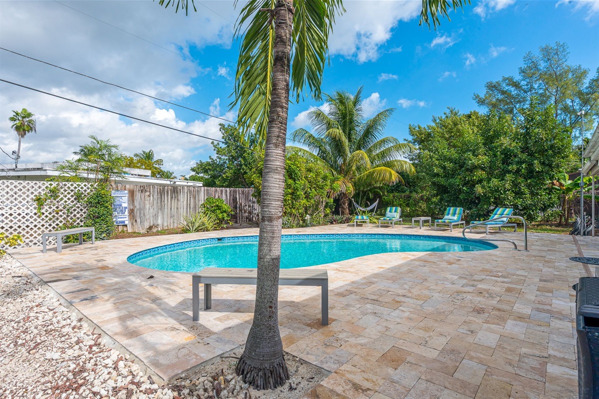 The outside is a highlight, with the heated pool, outdoor sun- loungers, BBQ and covered dining area.