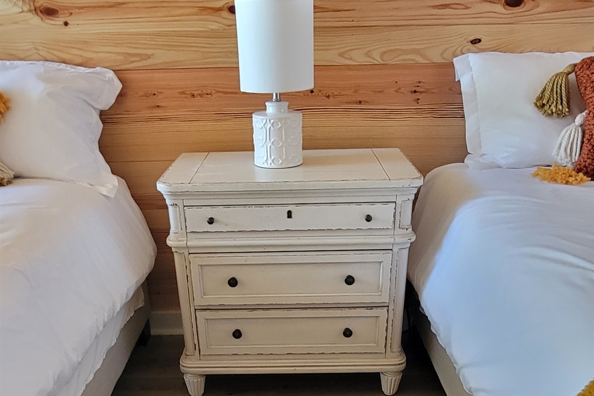 Night Stand and Lamp Between Loft Beds