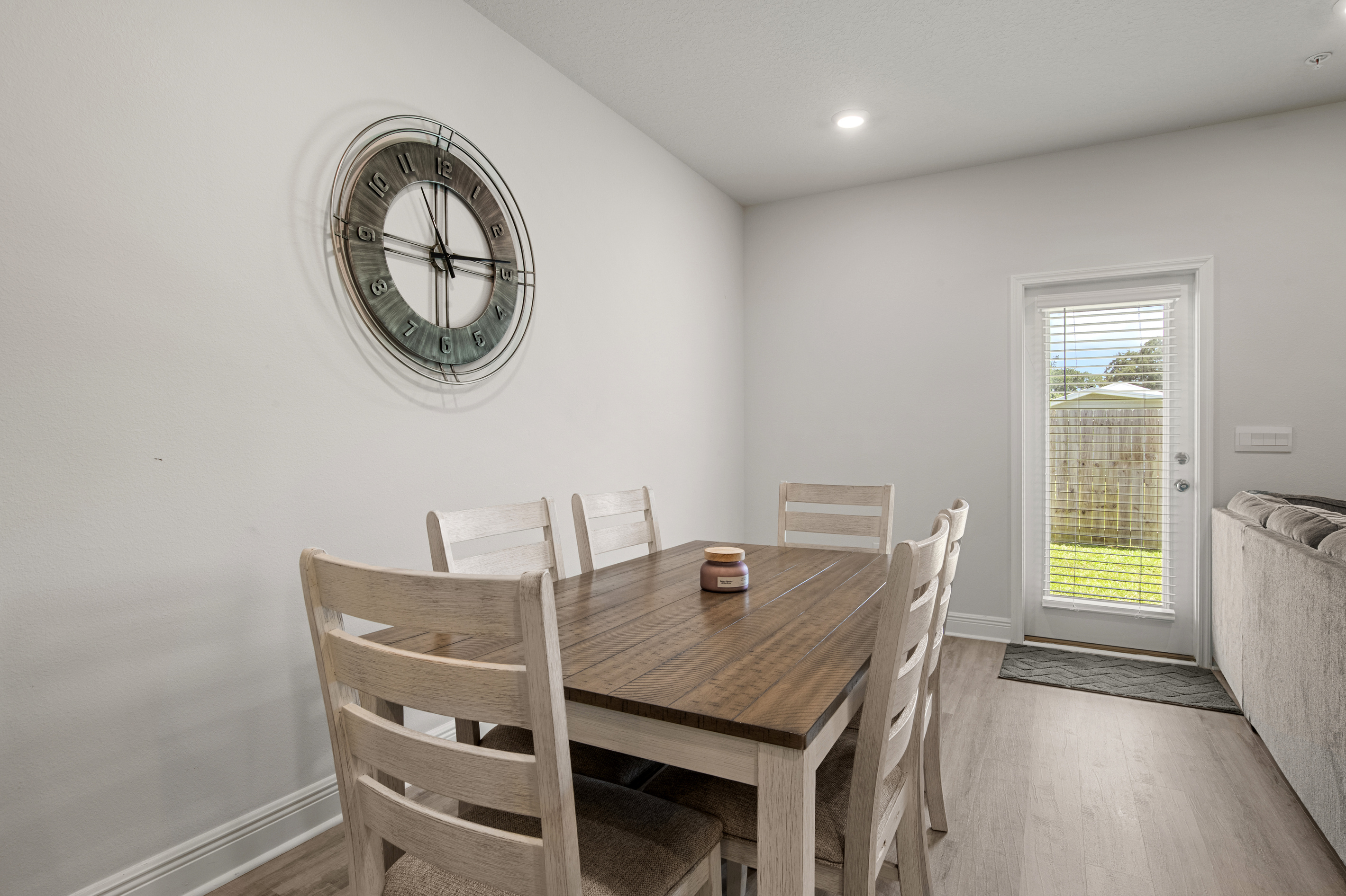 The dining table seats 6.