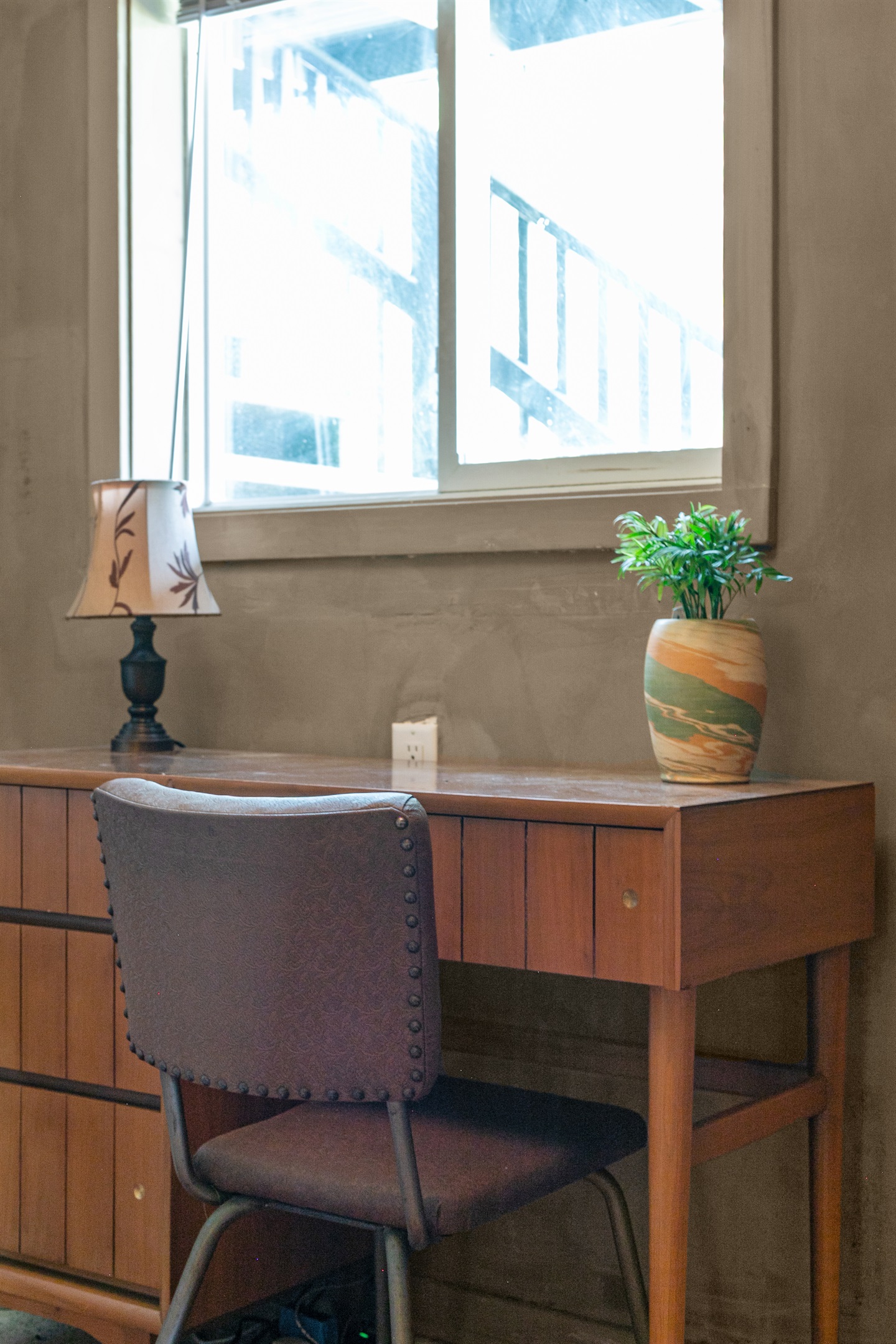 The den doubles as a quiet workspace, complete with a desk and chair. With Wi-Fi available throughout the home, it’s easy to stay connected while still enjoying the peace of your getaway.