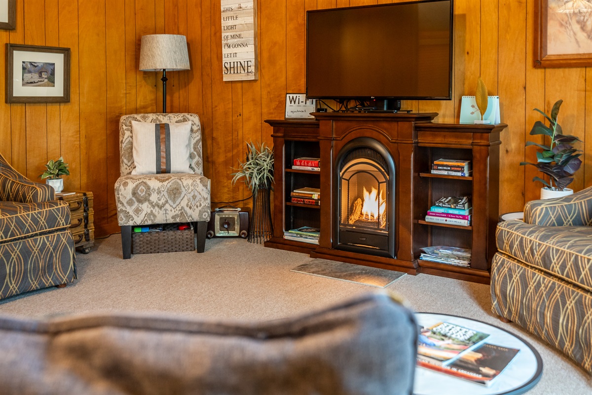 Stream your favorite shows and warm up in front of the gas fireplace