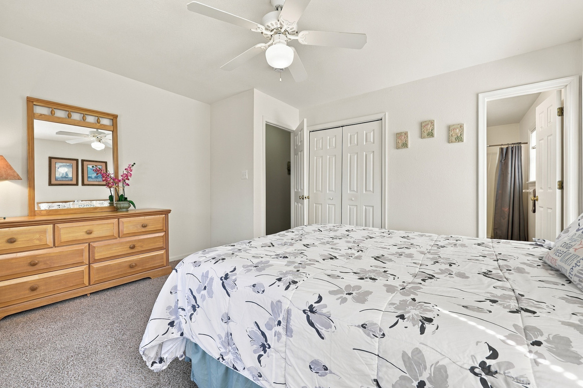 A full dresser and an attached bath make this bedroom an easy favorite.