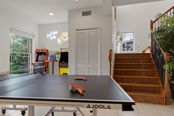 Large game area with Ping Pong table and Arcade games for endless fun times!