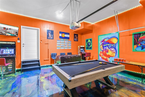 A playful oasis filled with bright orange hues and exciting entertainment options, from pool, airhockey, beerpong and foosball to arcade classics, making this the ultimate spot to unwind and have fun.