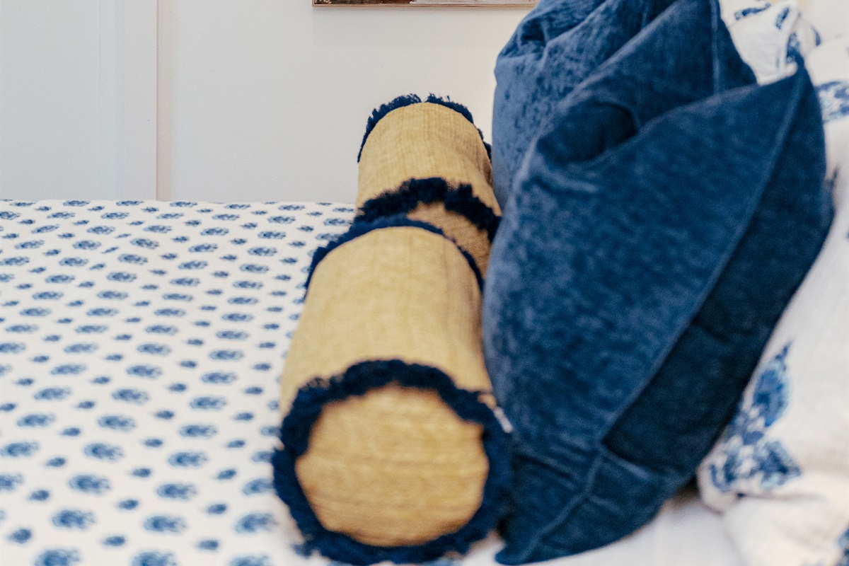 The second bedroom is next to the main bedroom, continuing the them of high design with a bonus additional seating area with plenty of space.