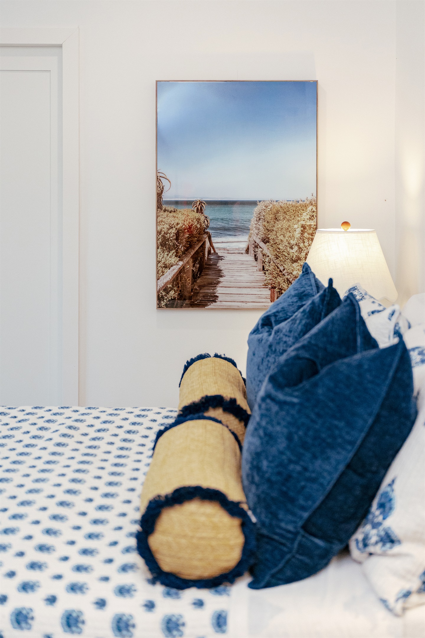 The second bedroom is next to the main bedroom, continuing the them of high design with a bonus additional seating area with plenty of space.