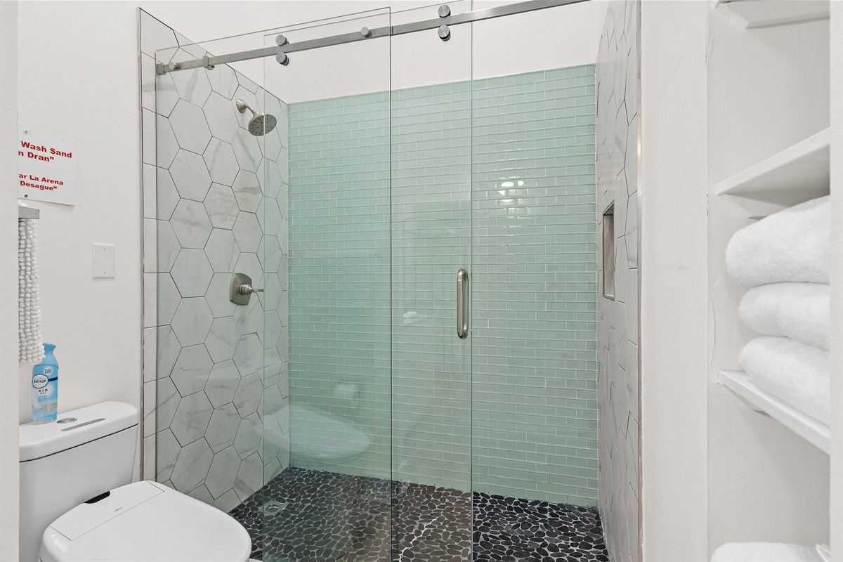 Master Bathroom (Level 3): Remodeled walk in shower, vanity, and large closet 