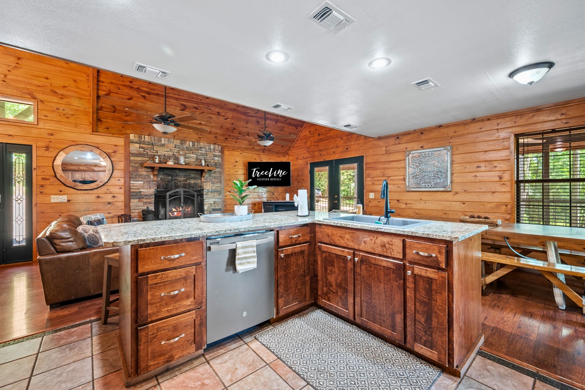 Open-concept layout with modern appliances, coffee station, and plenty of prep space.