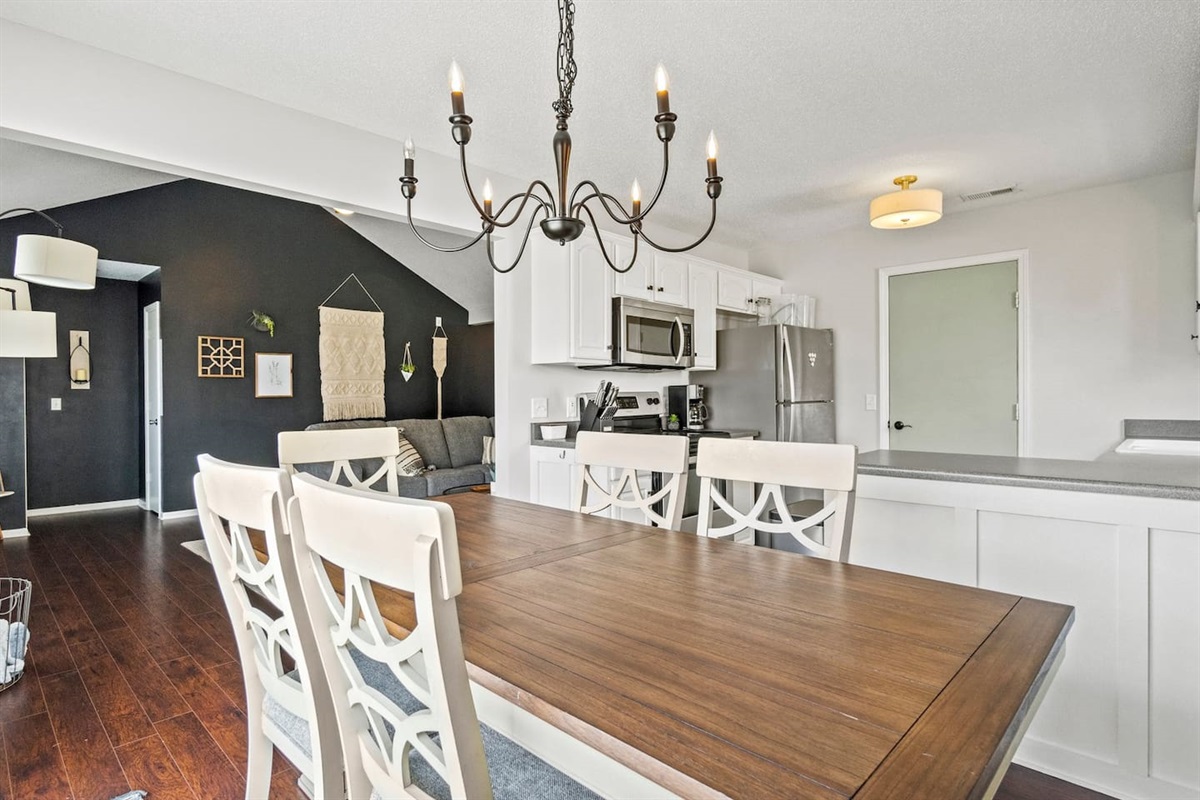 Connected to both the kitchen and living area, this dining space is ideal for entertaining, conversations, and making memories.