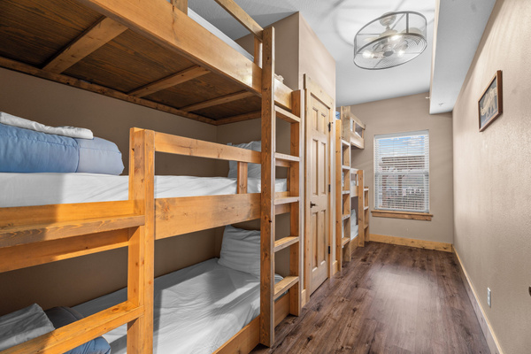 Bunk room on main level. Sleeps six. Full bathroom right across hall (not en suite).