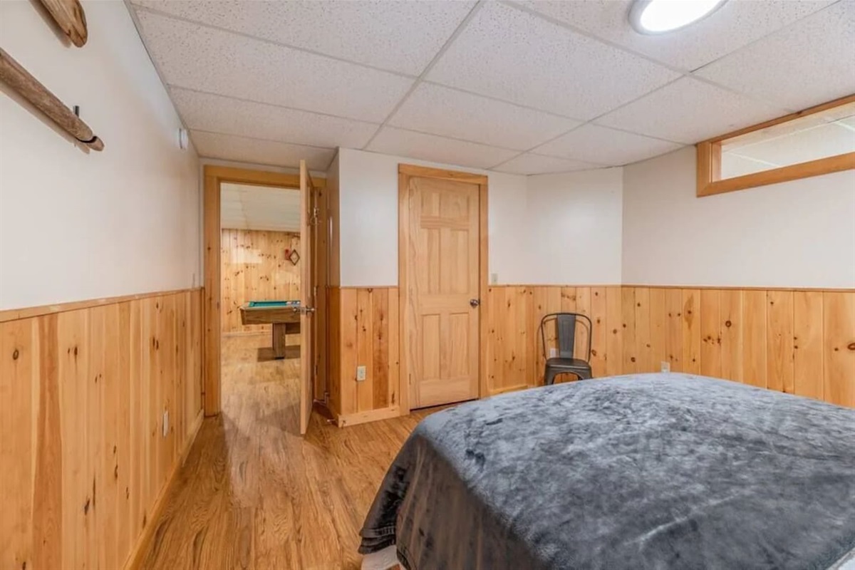 Bedroom in basement open to main living space